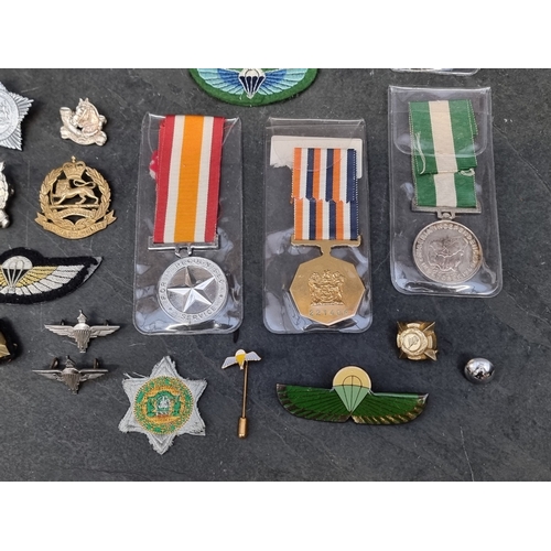 12 - A Rhodesia Light Infantry and other ranks beret; together with a General Service Medal, to 662242 Pt... 