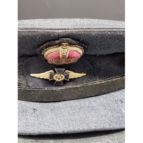 15 - A rare WWII RAF Padre or Chaplains peaked cap and badge, by Burberrys of London; together with a pai... 