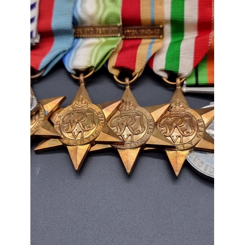 158 - Medals: a WWII Distinguished Flying Cross group of seven, to Flight Lieutenant John Rosher Stirling ... 