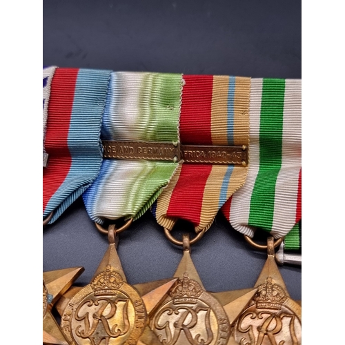 158 - Medals: a WWII Distinguished Flying Cross group of seven, to Flight Lieutenant John Rosher Stirling ... 