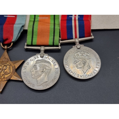 159 - Medals: a group of four, comprising: George V India GSM, with Burma 1930-32 clasp, to 537 8744 Priva... 