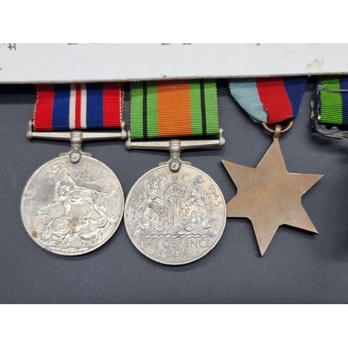 159 - Medals: a group of four, comprising: George V India GSM, with Burma 1930-32 clasp, to 537 8744 Priva... 