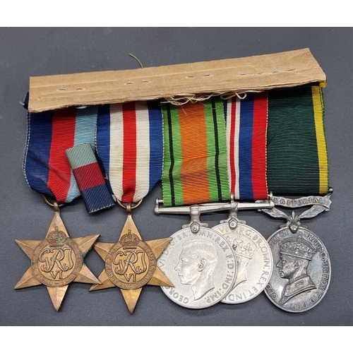 161 - Medals: a WWII group of five, to include a Territorial Efficiency Medal, to 7607267 Pte N.F Cosgrove... 