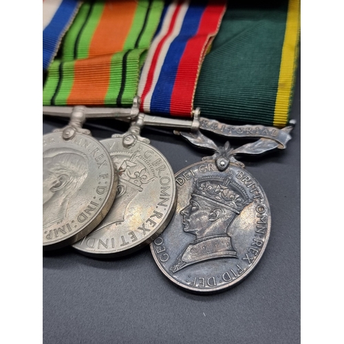 161 - Medals: a WWII group of five, to include a Territorial Efficiency Medal, to 7607267 Pte N.F Cosgrove... 