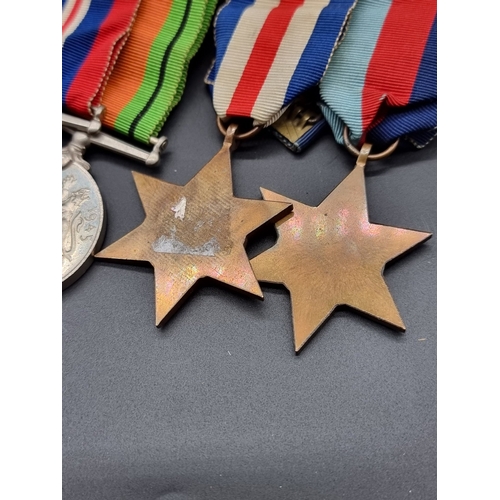 161 - Medals: a WWII group of five, to include a Territorial Efficiency Medal, to 7607267 Pte N.F Cosgrove... 