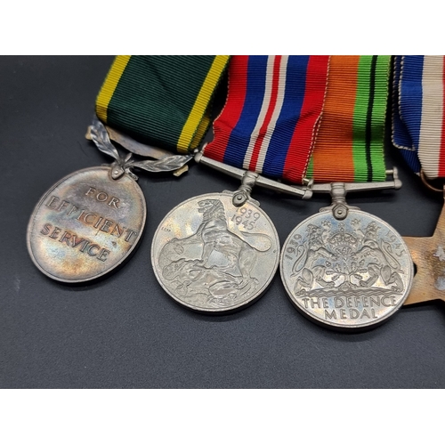 161 - Medals: a WWII group of five, to include a Territorial Efficiency Medal, to 7607267 Pte N.F Cosgrove... 