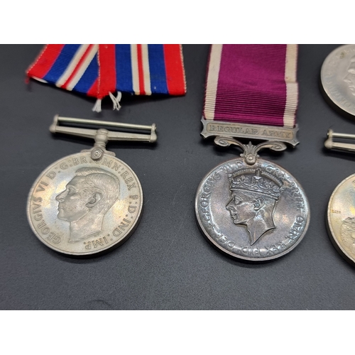 162 - Medals: a George VI Army Long Service and Good Conduct Medal, to 3383775 Pte R F Fuller E.Lan.R; tog... 