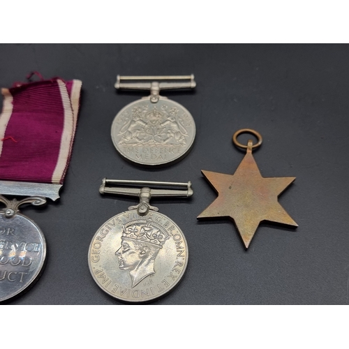 162 - Medals: a George VI Army Long Service and Good Conduct Medal, to 3383775 Pte R F Fuller E.Lan.R; tog... 