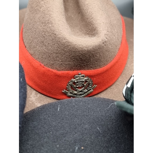 23 - A 1960s Gurkha Military Police officers slouch hat; together with two Royal Ulster Constabulary male... 