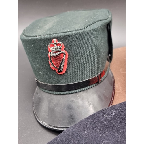 23 - A 1960s Gurkha Military Police officers slouch hat; together with two Royal Ulster Constabulary male... 