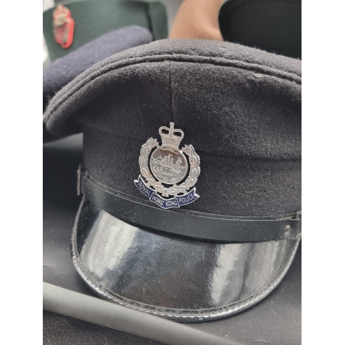 23 - A 1960s Gurkha Military Police officers slouch hat; together with two Royal Ulster Constabulary male... 