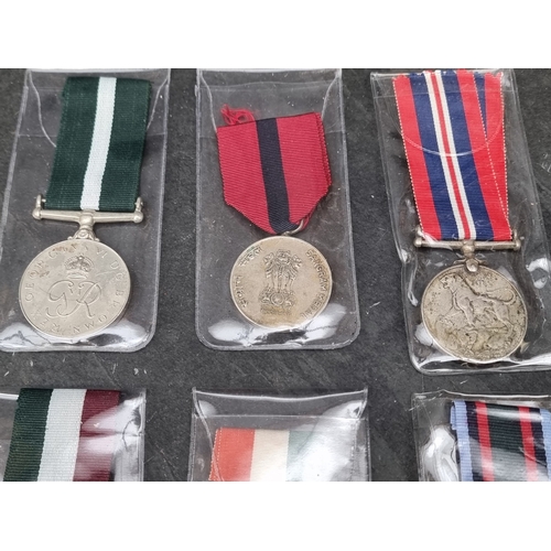 40 - Medals: twenty one WWII and later Indian & Pakistan medals, the Indian examples having various n... 