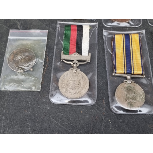 40 - Medals: twenty one WWII and later Indian & Pakistan medals, the Indian examples having various n... 