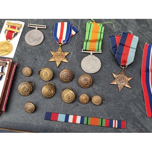 52 - Medals: a group of WWII Royal Marines ID tags, medals, badges, etc, to Lieutenant JCP Easy.... 