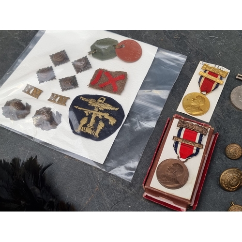 52 - Medals: a group of WWII Royal Marines ID tags, medals, badges, etc, to Lieutenant JCP Easy.... 