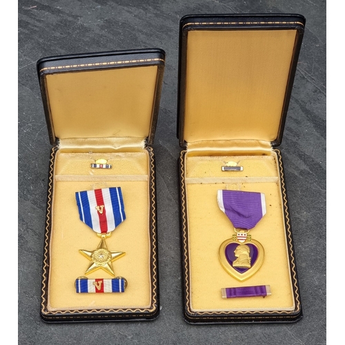 53 - Medals: a WWII US military Silver Star, with ‘V‘ for valour emblem; and a Purple Heart, with tunic m... 