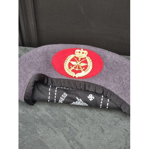 54 - A Royal Artillery Officer's visor cap; together with three various berets; and a quantity of Special... 