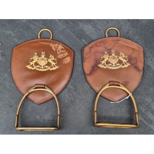 63 - A pair of Household Cavalry brass and leather stirrups.