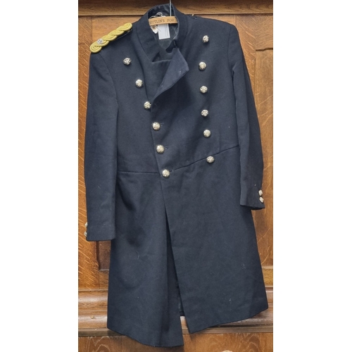 7 - A British army frock coat, possibly a Band Masters, with epaulettes for a Major.