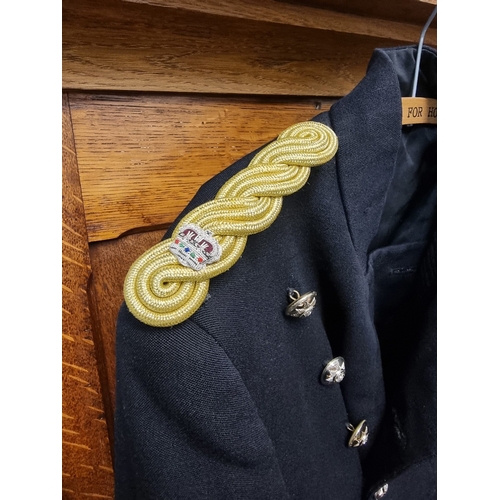 7 - A British army frock coat, possibly a Band Masters, with epaulettes for a Major.