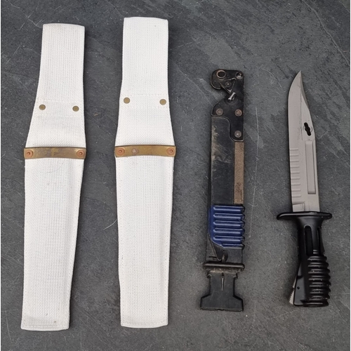 70 - A British Army SA80 bayonet and scabbard.