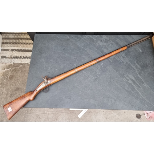 73 - An Eastern percussion three band musket, with octagonal barrel, overall length 152cm.... 