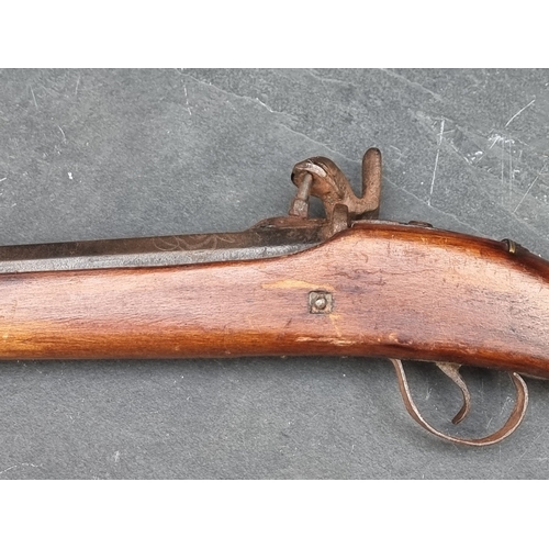 73 - An Eastern percussion three band musket, with octagonal barrel, overall length 152cm.... 