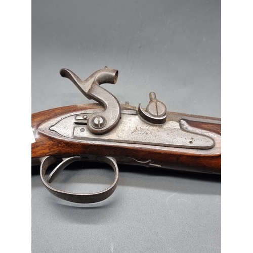 77 - A 19th century percussion pistol, (converted from flintlock), signed to lock plate and top of the oc... 