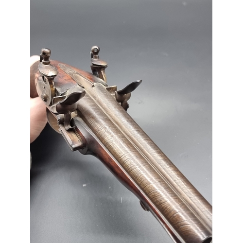 78 - A fine 18th century Continental double barrel flintlock pistol, possibly a coach pistol, having 17cm... 