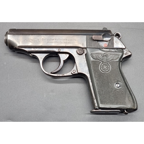 79A - A WWII Walther PPK pistol, serial No.317828K, with two magazines and holster; with deactivation cert... 