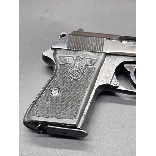 79A - A WWII Walther PPK pistol, serial No.317828K, with two magazines and holster; with deactivation cert... 