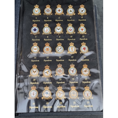 9 - A set of 100 'Royal Air Force Museum' badges for squadron group and command, in gold embossed leathe... 