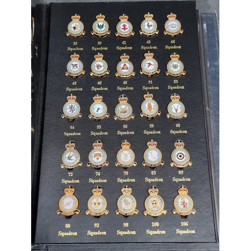 9 - A set of 100 'Royal Air Force Museum' badges for squadron group and command, in gold embossed leathe... 