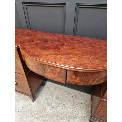 1064 - A Regency mahogany and ebony inlaid bowfront pedestal sideboard, 168cm wide x 50.5cm deep.... 