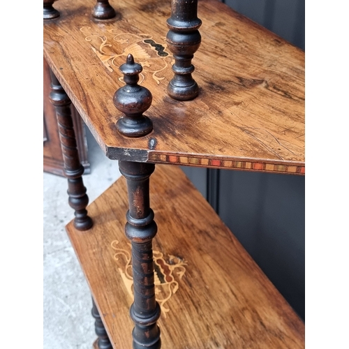 1003 - A Victorian walnut and inlaid four-tier whatnot, 71cm wide.