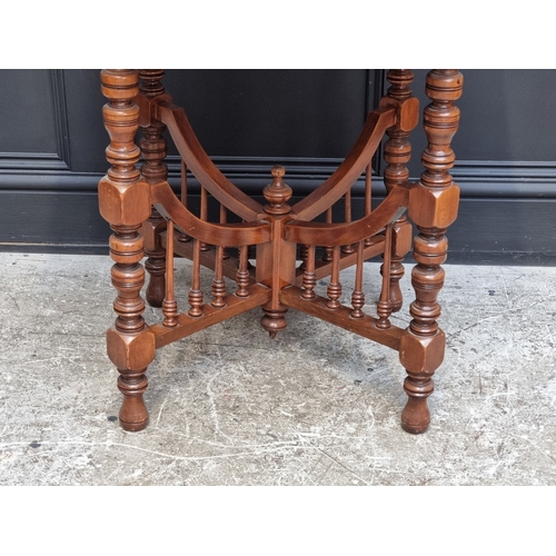 1015 - A circa 1900 walnut octagonal centre table, 74cm wide, (top warped).