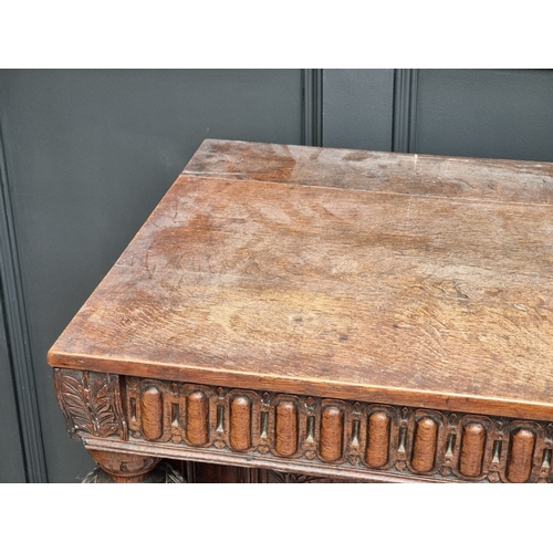 1023 - An antique oak and inlaid buffet, 108cm high x 125cm wide, (probable alterations).