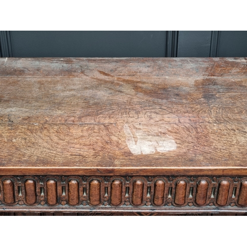 1023 - An antique oak and inlaid buffet, 108cm high x 125cm wide, (probable alterations).