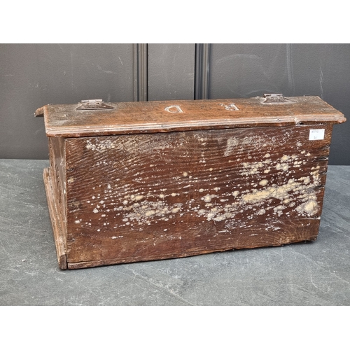 1039 - A late 17th century carved oak bible box, initialled 'R D', 43.5cm wide.