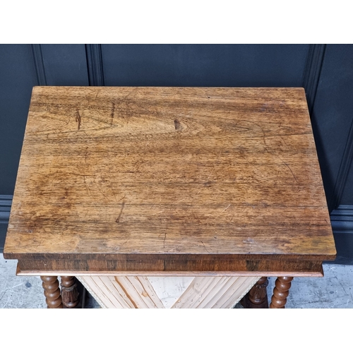 1053 - A 19th century rosewood work table, with bobbin turned supports, 54cm wide.