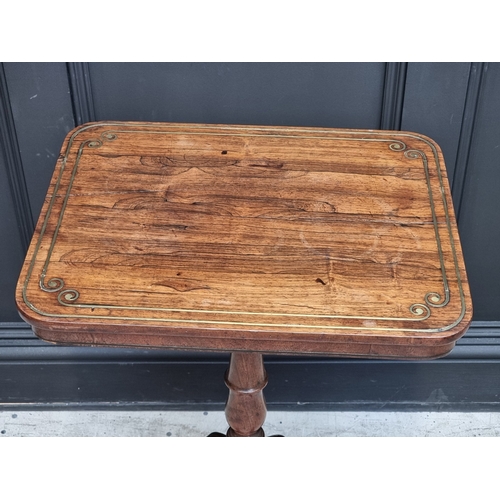 1059 - A late Regency rosewood and brass inlaid pedestal table, 50.5cm wide.