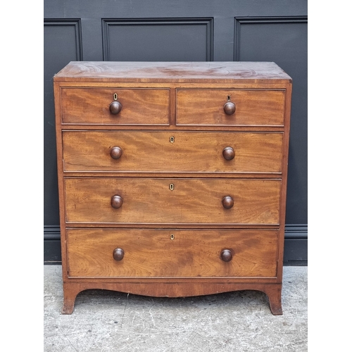 1061 - A George III mahogany and line inlaid chest of drawers, 91.5cm wide.