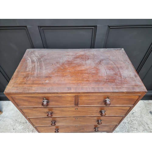 1061 - A George III mahogany and line inlaid chest of drawers, 91.5cm wide.