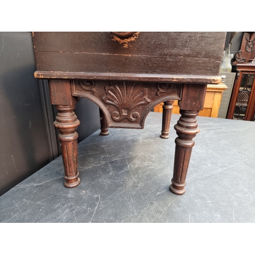 1030 - A Victorian rosewood Henry Brooks & Co patent adjustable piano stool, stamped.