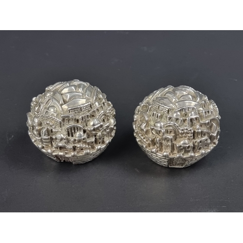 114 - A pair of Sam Philipe 'Jerusalem 3000' paperweights, 1997, approximately 5.5cm high.... 