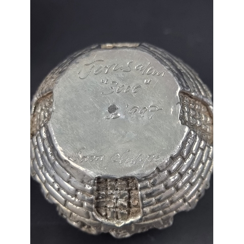 114 - A pair of Sam Philipe 'Jerusalem 3000' paperweights, 1997, approximately 5.5cm high.... 