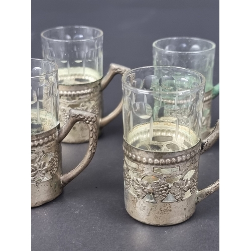 119 - A set of six Continental white metal mounted liqueur glasses, stamped 800, 53mm high.... 