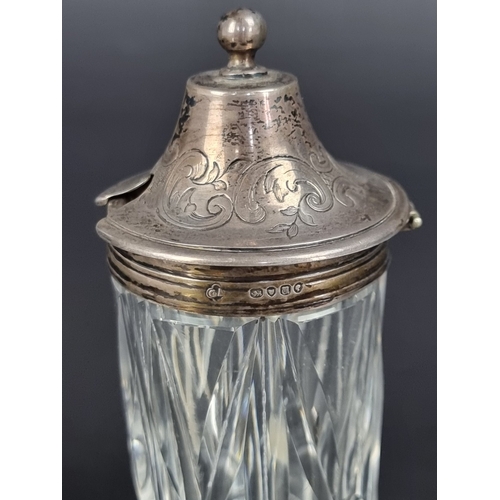 122 - A Victorian silver mounted cut glass salt bottle, by George Angell & Co, London 1855, 13cm high;... 