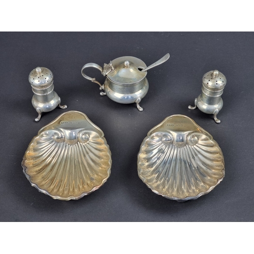 124 - A pair of Edwardian silver shell butter dishes, by William Thomas Imbrey, Birmingham 1903, 11cm wide... 