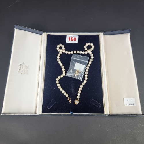 160 - A cultured pearl necklace, with 9ct gold clasp set pearl, 46.5cm; together with a similar pair of 9c... 